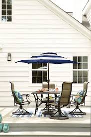 Keep Your Patio Looking And Feeling Cool With A Navy And White Striped Umbrella Click To Shop This Fresh Pati Patio Furniture Collection Patio Patio Furniture