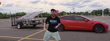 Check spelling or type a new query. Tesla Owner Charges Model 3 With Homemade Solar Panel Trailer