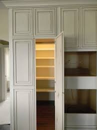 Home decorators collection cream painted plywood shaker stock assembled pantry kitchen cabinet 4 rots doors right 18 in. Kitchen Pantry Cabinet Is Perfect For Your Home Popular Looks Like A Regular Cabinet Itu0027s A Walk In Cheap Kitchen Cabinets Hidden Pantry Pantry Cupboard