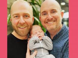 Two dads recall amazing moment they met their daughter for 1st time