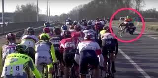 Driver of medical motorcycle hits pro cyclist, sends him brutally crashing to the ground