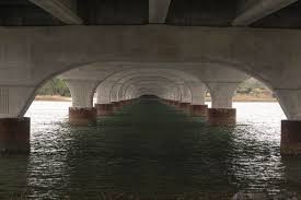 Maybe you would like to learn more about one of these? Water Under The Bridge Photograph By Walt Reece
