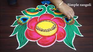 Rangoli designs are created on floor in front of the house and in places of worship. Simple Rangoli Beautiful N Simple Peacock Muggulu With Dots New Easy Rangoli Kolam Designs Facebook