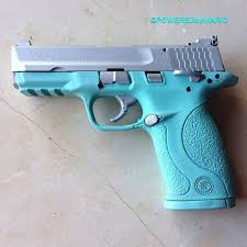 Smith Wesson M P 22 Compact Cerakoted In Tiffany Co Blue And Crushed Silver Pretty Guns Guns Hand Guns