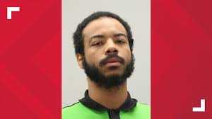 Man in custody, charged with murder in connection with Newport News  shooting