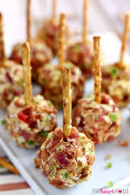 These christmas appetizers are perfect for kicking off christmas dinner or a festive holiday party. 17 Appetizer Bites Starring Bacon Delish Recipes Appetizer Bites Cheese Ball Recipes