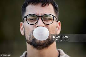 196 Man Blowing Bubble Gum Stock Photos, High-Res Pictures, and Images