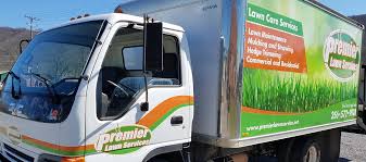 Full service landscape construction company. Premier Lawn Services Box Truck Wrap Accel Graphics