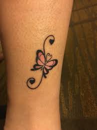 Feminine Butterfly Tattoo By The Ankle With Swirls And Hearts The Swirls Make An S For My Name Butterfly Tattoos For Women Tattoos For Women Butterfly Tattoo