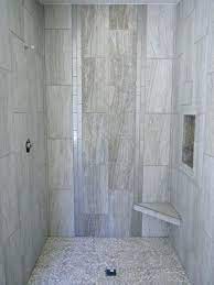Black and white bathroom design with white brick wallpaper wall. 12x24 Brick Pattern Tile Shower Novocom Top