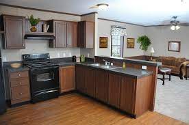 A gorgeous modern double wide remodel designed by dawn moore features modern materials along with clean, minimal lines. Mobile Home Remodeling Ideas Mobile Home Kitchens Kitchen Remodel Small Home Remodeling