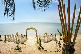 Yellow Themed Beach Ceremony Using Yellow Chrysanthemums And White Roses Weddings In Thailand
