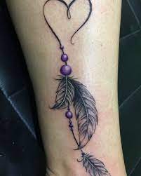 The spirit of the bird which is symbolized by the feather has the power to purify our spirit and clean the energetic environment. Feather Tattoo Design Feather Tattoos Indian Feather Tattoos