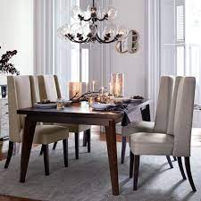 Maybe you would like to learn more about one of these? West Elm Angled Leg Expandable Table
