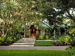 Paloform's collection of fire pit designs offer sculptural shapes in simple vessels for contemporary settings. Modern Tropical Landscape Entry Shade Bromeliads Palms Gradual Steps Tropical Landscaping Tropical Landscape Design Tropical Garden Design