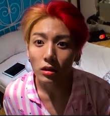 What is the reason for Jungkook's different appearance in the music video  for BTS' 'Dynamite'?