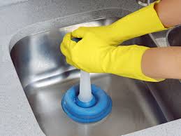 how to use a plunger to unclog a sink drain