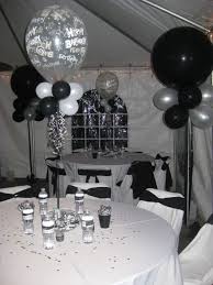 The color scheme was black, white, and grey, with pops of chevron pattern scattered throughout. Black And White Men S 40th Birthday Party Black And White Party Decorations White Party Decorations Silver Party Decorations