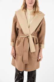 Once a military staple, it's since evolved into a true style statement frequently spotted on the runways, either in the classic camel hue or more. Brunello Cucinelli Camel Wool Reversible Trench Women Glamood Outlet