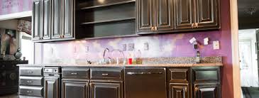 Kim was kind enough to allow redposie to come in to her home and photo shoot her cabinet painting project. Black Distressed Kitchen Cabinets