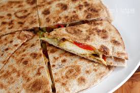 Place two tortillas, buttered side down, on a griddle; Chicken Quesadillas Skinnytaste