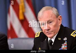 Chairman of the Joint Chiefs of Staff Gen. Martin E. Dempsey introduces  Chief of Defense of Denmark Gen. Peter Bartram to a member of his staff,  Lt. Cmdr. Chris Schwartz, before a