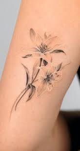 The lily tattoo designs are mainly chosen by girls but guys can try it too. 12 Cute Lily Tattoos Plus Their History Meaning