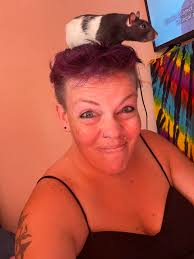 Does the rat know I'm also a rat?