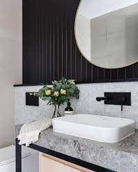 Powder Room Perfection Contrasting Black Accents Showcased In V Groove Panelling Blac Powder Room Ideas Modern Powder Room Small Bathroom Design Inspiration