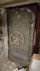 The wide opening allows storage items such as deck and patio furniture, and large items such as pool tables and furniture, to be easily moved in and out of a basement. An Abandoned Vault Door In The Basement Of A Bank 9gag