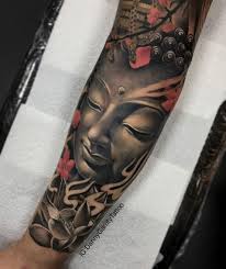 Tattoo buddha lotus flower drawing. Realistic Buddha Face Tattoo With Lotus Flower Realistic Flower Tattoo Buddha Tattoo Design Buddha Face