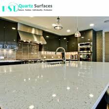 Kitchen countertops topped with tropical white quartz and stainless steel sink. China Iced White Quartz Slabs For Kitchen Countertop China White Quartz Kitchen Countertop Ice White Quartz Countertop