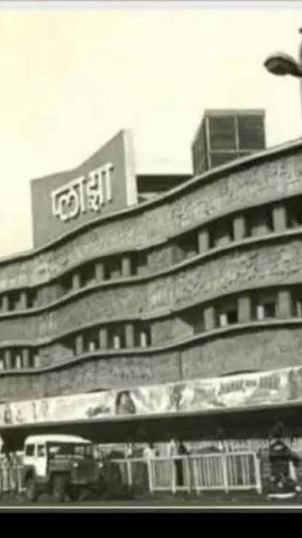 Standing outside Regal Cinema, Colaba — the theatre that changed Mumbai's movie culture forever. Built in 1933, Regal was one of India's first Art Deco theatres with full air-conditioning, an elevator, and