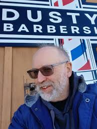 What is the best barber shop in DeKalb, IL, for an older person with simple  needs?