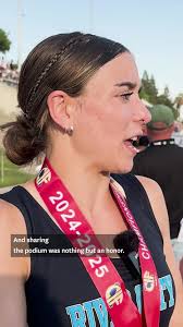 A California transgender athlete shares the podium after earning 2nd place  in the long jump at a state meet.