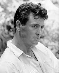 Guy Madison and Robert Mitchum being photographed together in a publicity  still from the movie Till the End of Time (1946) dir. Edward Dmytryk