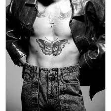 Pin By Lindsay Tobin On Harry From 1d To Pre Fine Line Harry Styles Butterfly Harry Styles Pictures Harrys Butterfly Tattoo
