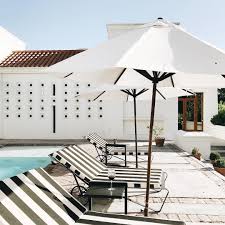 Black And White Outdoor Umbrella Black And White Lounges By The Pool Cool Places To Visit Travel Lifestyle Rectangular Pool