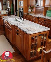 Cherry Toffee Brown Glazed Kitchen Cabinets Are Complimented By The Antique Mascarello Bevel Cherry Cabinets Kitchen Glass Kitchen Cabinet Doors Cherry Kitchen