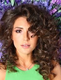 How to Avoid Pyramid Head, According to Top Curl Stylists