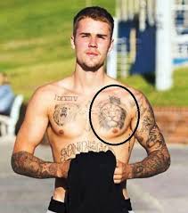 Justin Bieber S 42 Tattoos Their Meanings Body Art Guru Justin bieber has a wrist tattoo of an angel with a face that is an exact replica of selena gomez.