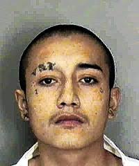 Teen charged in gang-related murder