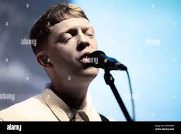 Male guitarist bassist in band hi-res stock photography and images