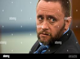 Chief Deputy District Attorney Eric Bauman consults with his fellow  prosecutor during the preliminary hearing for Galina Stoyanova Kilova,  Wednesday, Dec. 31, 2014, in Las Vegas. Kilova, of Bulgaria, is accused in