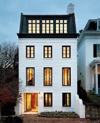 Find ideas and inspiration for red brick black window to add to your own home. Discover The New Black In Interior Design House Exterior Architecture Exterior Design