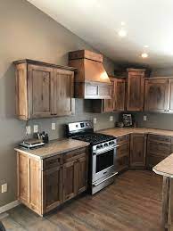 This will give the bathroom and kitchen a monochromatic feel, especially if the walls or paneling are painted a deep amber or maroon color. Rustic Maple Cabinets Rustic Kitchen Other By Kannas Custom Cabinets Inc Houzz