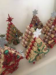 The paint dipped look gives it additional sass as it creates a writing. 45 Mini Wine Cork Diy Ideas To Christmas Ornaments Cork Crafts Christmas Wine Cork Crafts Christmas Wine Cork Christmas Tree