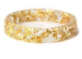 But did you check ebay? Sparkling Gold Flake Resin Bracelet
