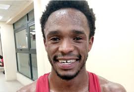 South Africa's John Paul Masamba took it easy against Zambia's Emmanuel  Katema