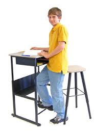 Standing desk adjusts from 42h for standing down to 26h for sitting. Alphabetter Standing Desk
